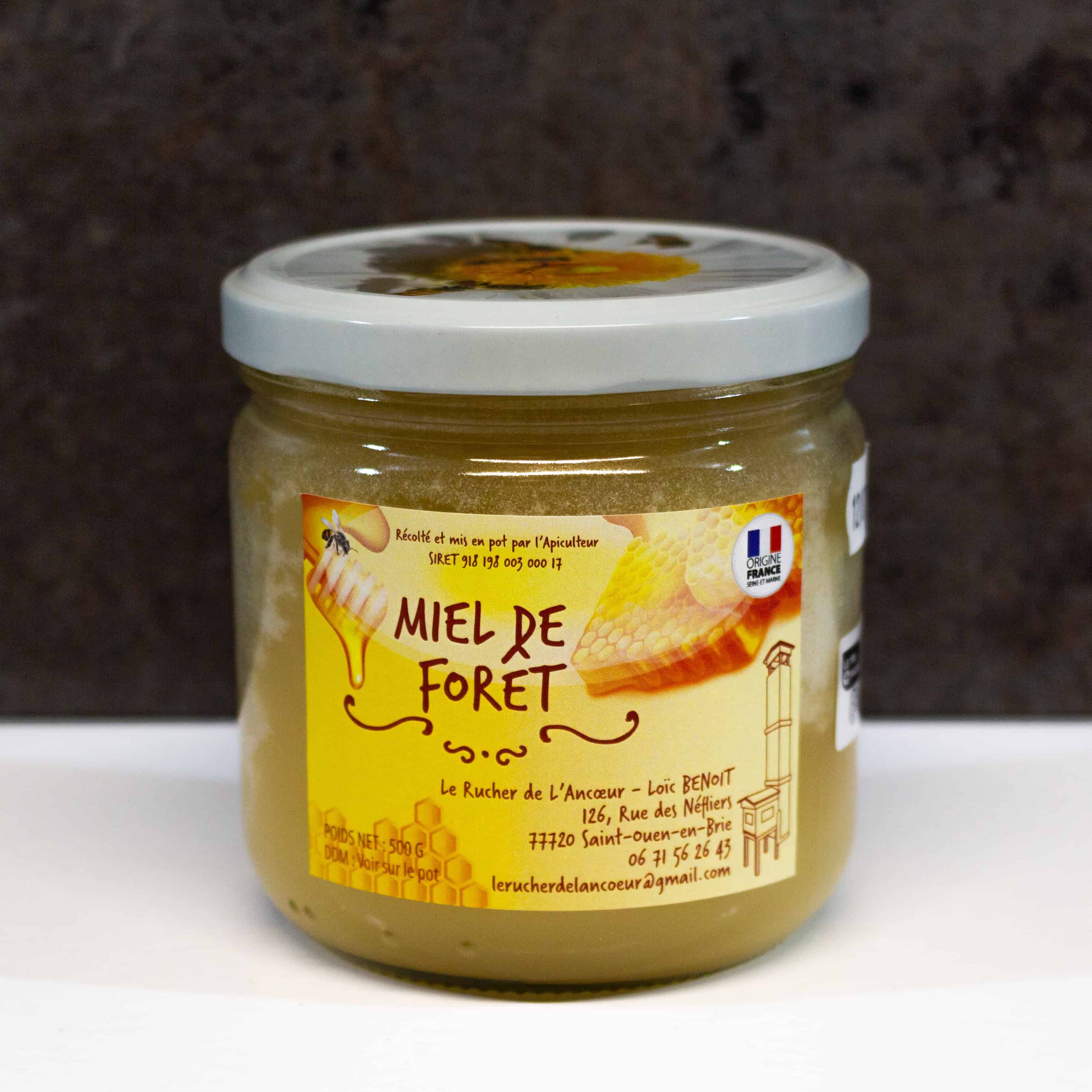 Miel de forêt 500g sur fond blanc, miel ambré